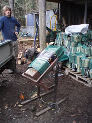 Bagging local seasoned hardwood logs for national stores